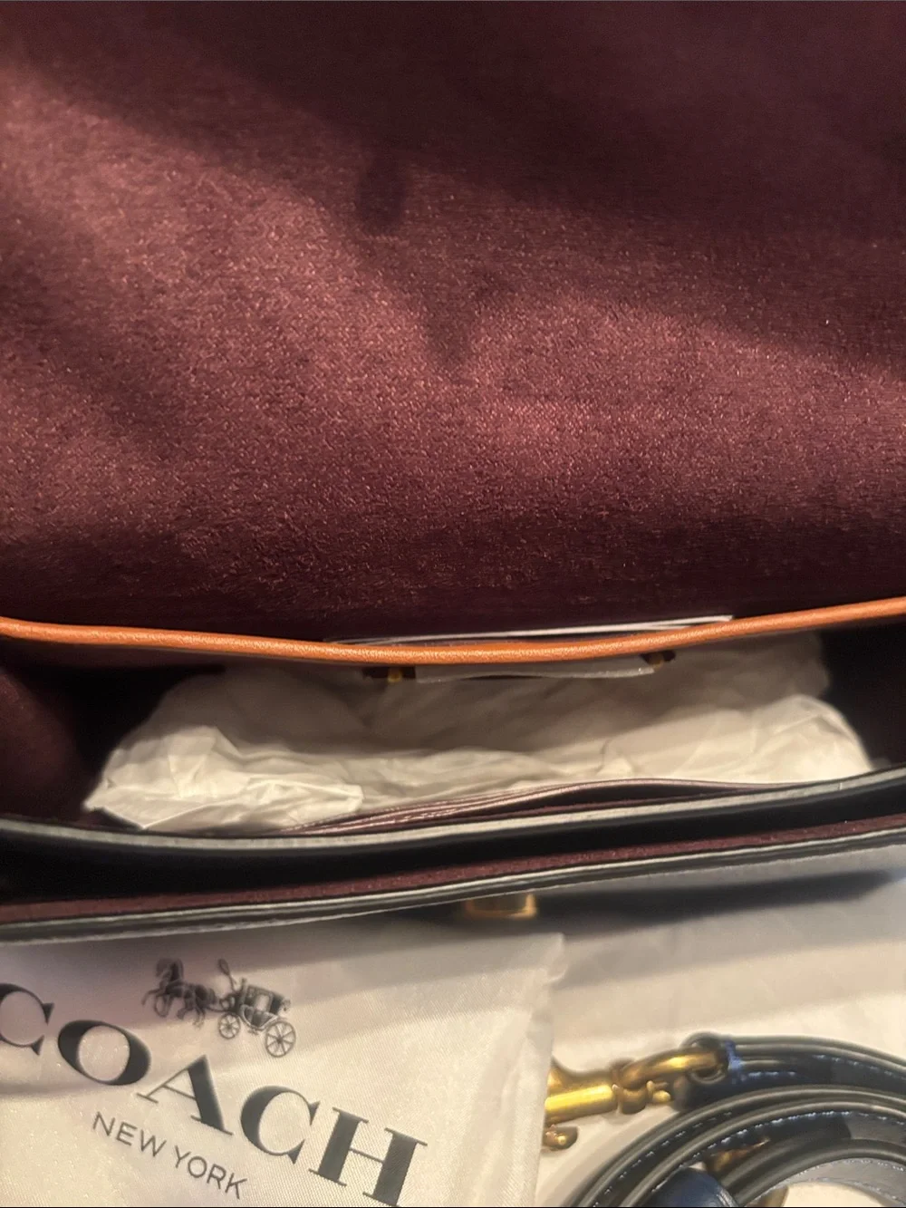 Coach sleek leather